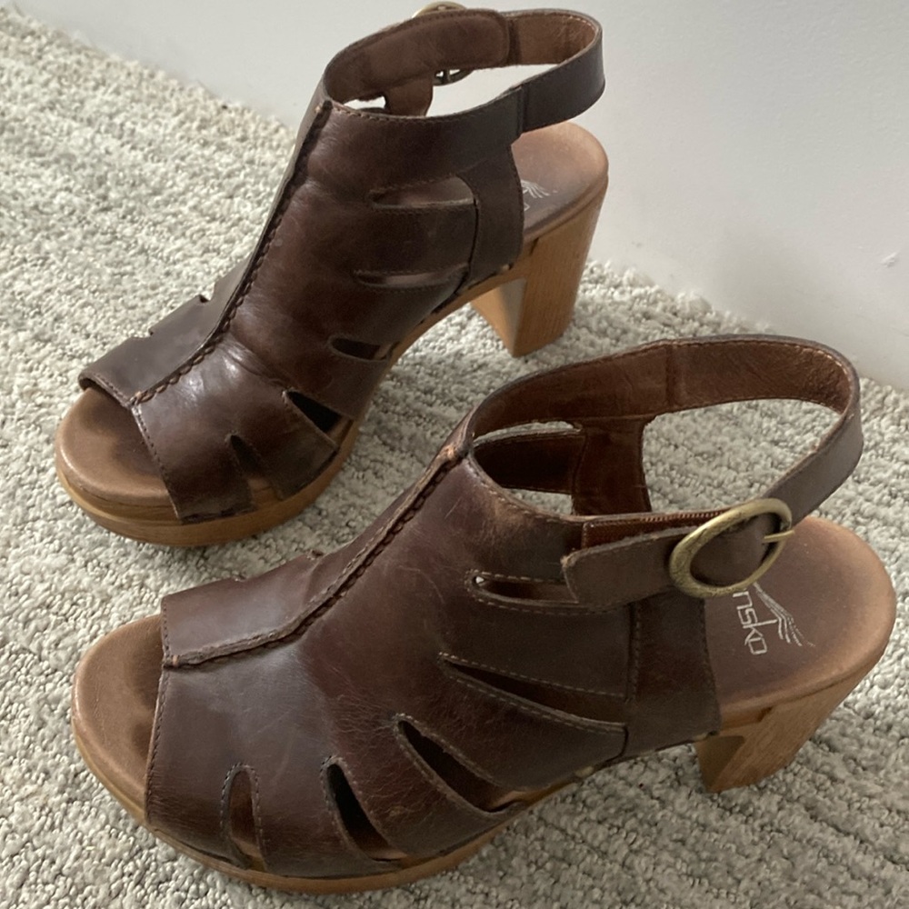 Women’s size 38 brown leather Dansko slide in Velcro strap heeled sandal.